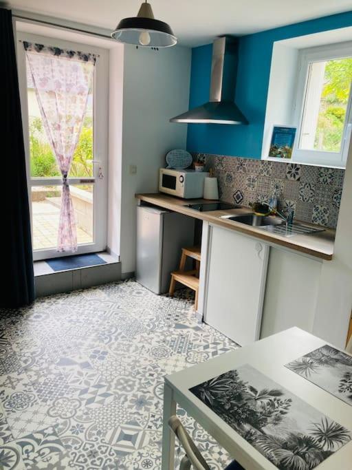 Logement Independant,Calme A 2 Pas Du Centre Ville ลันยง ภายนอก รูปภาพ